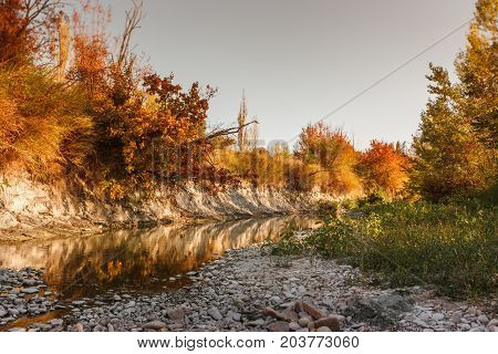 A Trail Beside A River In Valconca, Italy