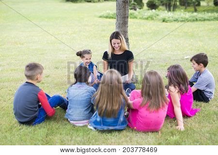 The Great Portrait Of School Pupil Outside Classroom Carrying Bags
