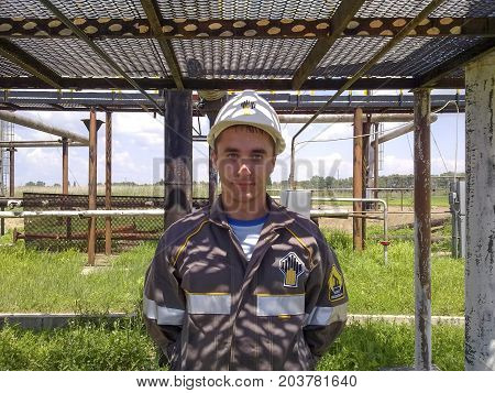 The Man In The Overalls Of Rosneft. Corporate Form In Rosneft.