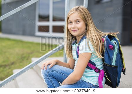 A nine years old girl student at school