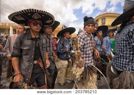 June 25 2017 Cotacachi Ecuador: the Inti Raymi parade occassionally turns violent between the participating indigenous groups