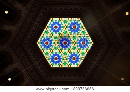 SARAJEVO BOSNIA AND HERZEGOVINA - APRIL 16 2017: Interior of the main hall of the Vijecnica the former library and city hall of Sarajevo destroyed during the 1991-1995 conflict and reconstruted characterized by its ottoman style