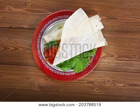 Matbucha with pita. breakfast Maghreb , close up meal
