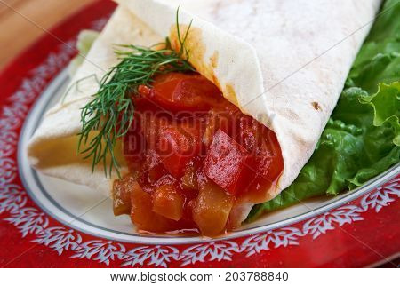 Matbucha with pita. breakfast Maghreb , close up meal