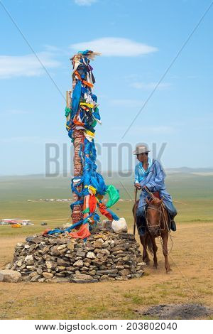 Mongolian Man Horseback Circumambulating Stupa