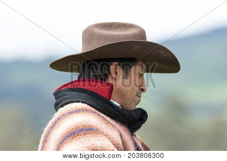 June 3 2017 Machachi Ecuador: closeup portrait of a cowboy in the andes wearing traditional clothing