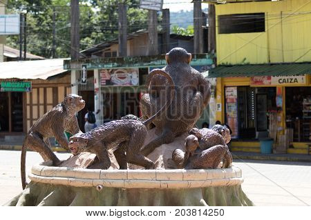 June 6 2017 Puerto Misahualli: monkey statues in the centre of the tourist destination town by the Napo river
