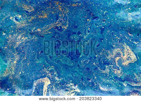 Marbled abstract background. Liquid marble pattern. Colorful marble backdrop. Golden glitter texture