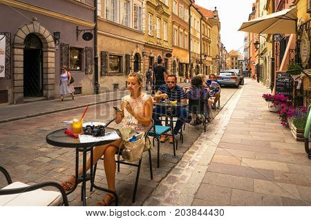 Warsaw, Poland - August 2, 2017: Architecture And People On The Street New World In Warsaw.