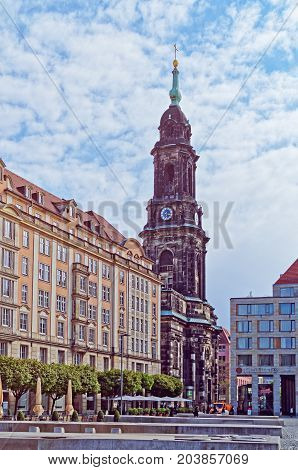Dresden, Germany - April 19, 2017: View of the dark towers of the Kreuzkirche church from Altmarkt square