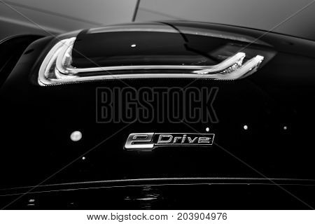 BERLIN - NOVEMBER 28 2014: Showroom. Stoplight of the BMW i3 previously Mega City Vehicle (MCV) is a five-door urban electric car developed by the German manufacturer BMW. Black and white.