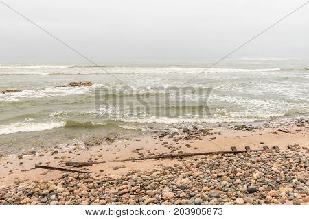 Rusted railroad tracks at the mouth of the Swakop River at Swakopmund in the Namib Desert