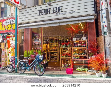 Kawagoe, Japan - May 14, 2017: Close up of flower store, with a biked parked at outdoors in Kawagoe, Japan.