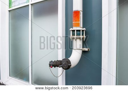 Fire hydrant installed on the building.Used for when there is a fire
