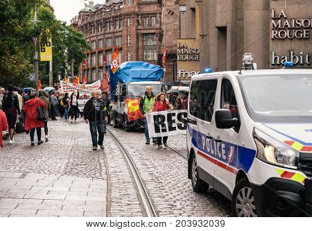 STRASBOURG FRANCE - SEPT 12 2017: Demonstrators with Resistance banner at political march during a French Nationwide day of protest against the labor reform proposed by Emmanuel Macron Government
