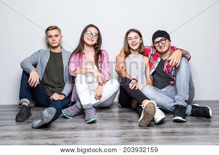 Young Group Of Friends Students Teengers Sitting On Floor