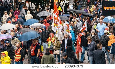 STRASBOURG FRANCE - SEPT 12 2017: View from above of demonstrators walk at political march during a French Nationwide day of protest against the labor reform proposed by Emmanuel Macron Government