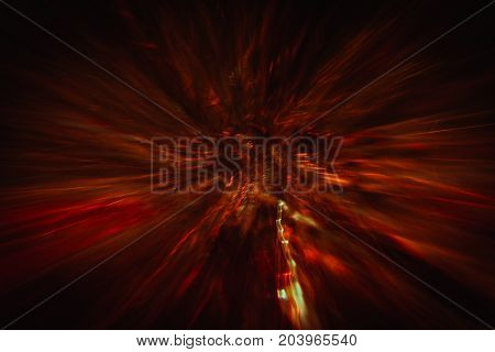 Abstract background of colorful crankles in motion. Bokeh of defocused curves spinning into spiral, blurred neon yellow and red leds, hell and chaos, abyss and seven circles of hell