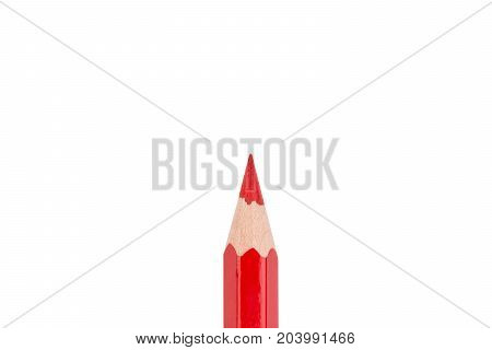 One red pencil on a white background in the middle