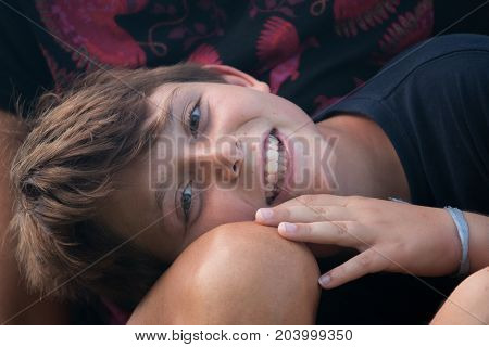 Close-up of young boy in a garden
