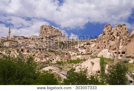 View Of Uchisar And Uchisar Fortress From Pigeon Valley. Cappadocia,  Turkey.