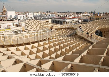 SEVILLE, SPAIN - APRIL 2, 2019: The walkway on the roof of the Metropol Parasol. Completed in 2011, the structure is known as Las Setas de Sevilla (Mushrooms of Seville).