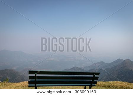 Isolated Sitting Bench With Amazing Landscape Image Is Taken At Coakers Walk Kodaikanal Tamilnadu In