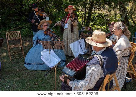 Duncan Mills, California, July, 15, 2018: Musicians Playing And In The Costume  Of The Era During Th