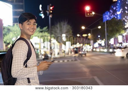 Traveling In The City At Night  Searching Gps Online Maps Application. .