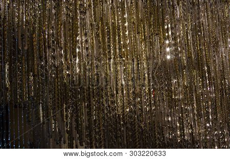 Glittering Gold And Silver Chandelier In Las Vegas, Nevada. Close Up Of Chandelier In Atrium. Backgr