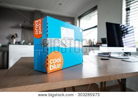 Amsterdam, The Netherlands, 05/27/2019. Coolblue Package Is Waiting On The Table To Return