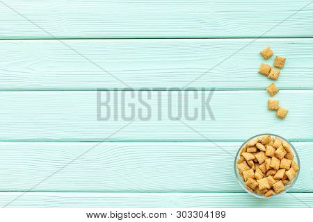 Cereals, Oatflakes And Cornflakes For Healthy Breakfast On Mint Wooden Background Top View Mock Up