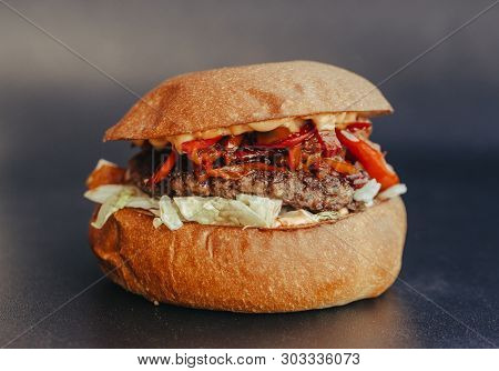 Burger Flyer. Cheese Burger With Grilled Meat, Cheese, Salad And Onion Rings. Close-up Of Delicious 