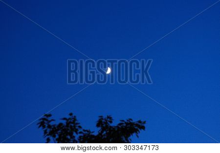 Sickle Moon On Sky At Dry Lunar Night