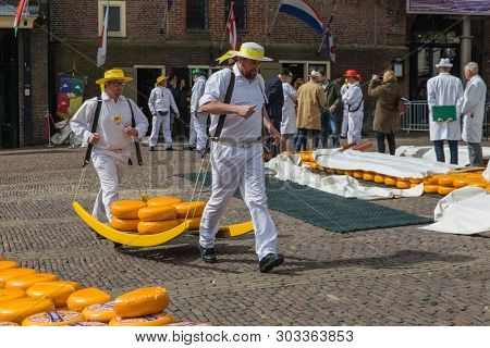 Alkmaar, Netherlands - April 28, 2017: Cheese carriers at traditional cheese market.