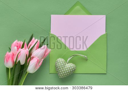Springtime Green  Background With Pink Tulips, Hyacinth, Wrapped Gift Boxes And Decorative Stuffed H