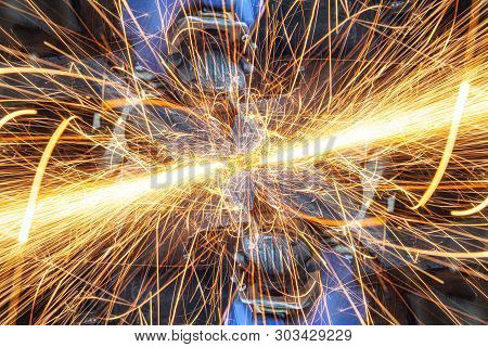 Sparks Flying While Machine Griding And Finishing Metal