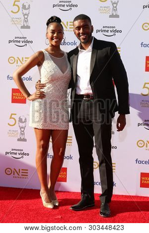 LOS ANGELES - MAR 30:  Joi Liaye, Etienne Maurice at the 50th NAACP Image Awards - Arrivals at the Dolby Theater on March 30, 2019 in Los Angeles, CA