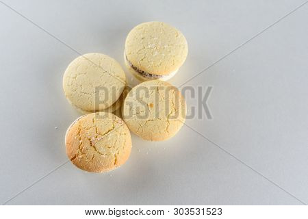 Delicious Argentinian Cookies Alfajores With Cream Dulce De Leche Close-up On The Table. White Vanil