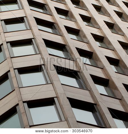 Modern Office Building With A Rhythmic Arrangement Of Windows