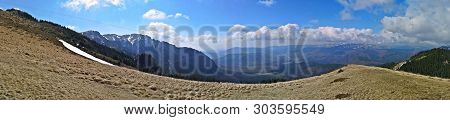 Panoramic Mountains Landscape In Early Spring - Snow In The Mountains