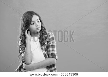 Daydreaming Concept. Kid Thoughtful Face Make Decision. Child Cute Curly Hair Thinking. Girl Casual 