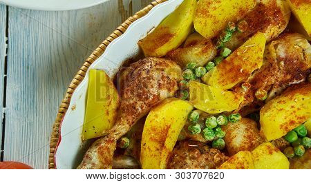 Chicken Vesuvio  A Skillet With Potatoes, Garlic, Snap Peas  , Italian-american Cuisine, Traditional