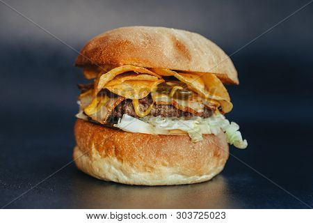 Burger Flyer. Cheese Burger With Grilled Meat, Cheese, Salad And Onion Rings. Close-up Of Delicious 