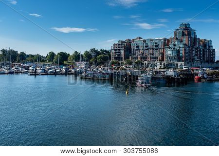 A Marina At The Entrance To Victoria Harbour, Vancouver Island, Canada, Sparkling Blue Waters And Br