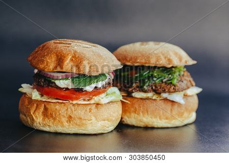 Burger Flyer. Cheese Burger With Grilled Meat, Cheese, Salad And Onion Rings. Close-up Of Delicious 