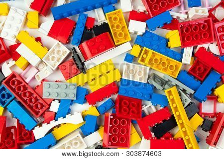 Lot Of Colorful Rainbow Toy Bricks Background. Educational Toy For Children Isolated On White Backgr