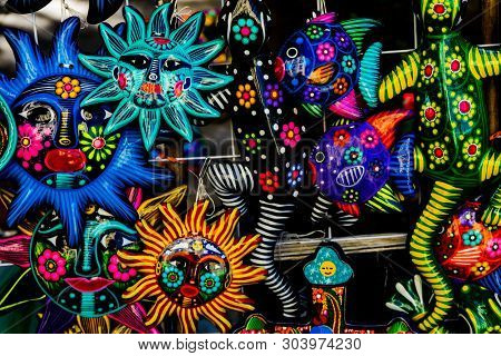 Oaxaca, Mexico - January 5, 2019 Colorful Mexican Ceramic Sun Face Fish Handicraft Blue Turquoise Ye
