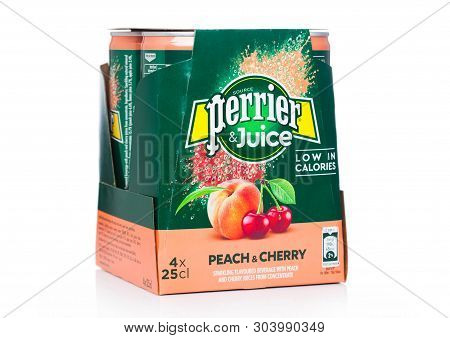 London, Uk - May 29, 2019: Pack Of Perrier And Juice With Peach And Cherry Flavour On White.