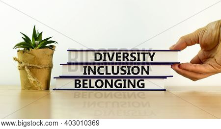 Diversity, Inclusion And Belonging Symbol. Books With Words 'diversity, Inclusion And Belonging' On 